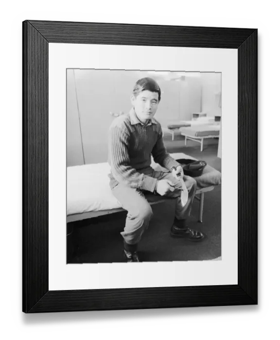 Framed Print : Gurkha rifleman Rambahadur Gurung seen here cleaning his Kukri in barracks before a kit