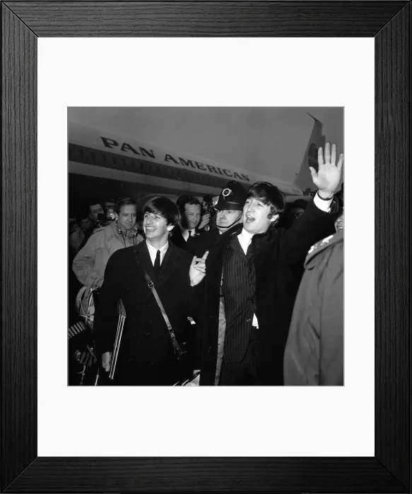 Framed Print : Ringo Starr and John Lennon of The Beatles arriving in the UK before The Daily Mirror