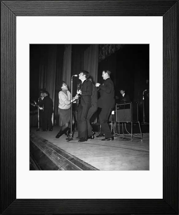 Framed Print : A female fans gets onto the stage with The Beatles at Stockton. 22nd November 1963 Framed Print : A female fans gets onto the stage with The Beatles at Stockton. 22nd November 1963