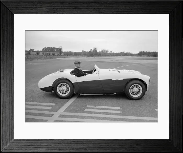 Framed Print : Daily Herald motor racing correspondent Thomas H Wisdom sitting at the wheel of an Framed Print : Daily Herald motor racing correspondent Thomas H Wisdom sitting at the wheel of an