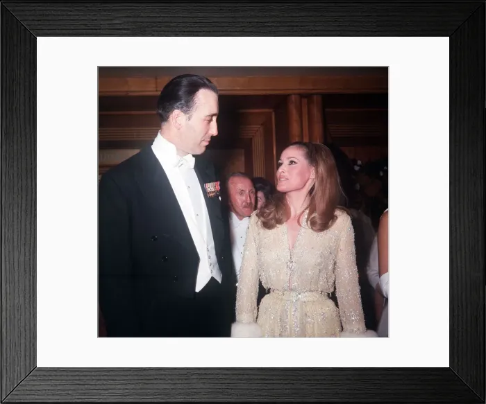 Framed Print : Christopher Lee & Ursula Andress pictured arriving at Royal premiere of film Born Free Framed Print : Christopher Lee & Ursula Andress pictured arriving at Royal premiere of film Born Free
