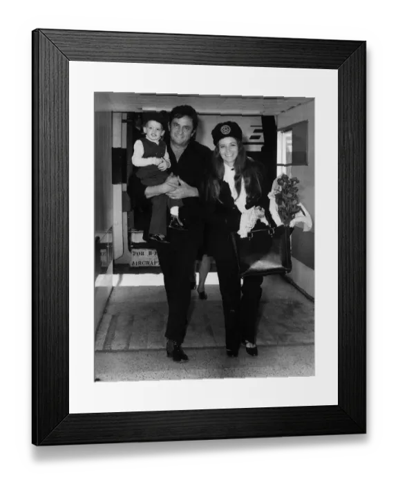Framed Print : Johnny Cash singer with wife June Carter in London 1971 with son John Cash