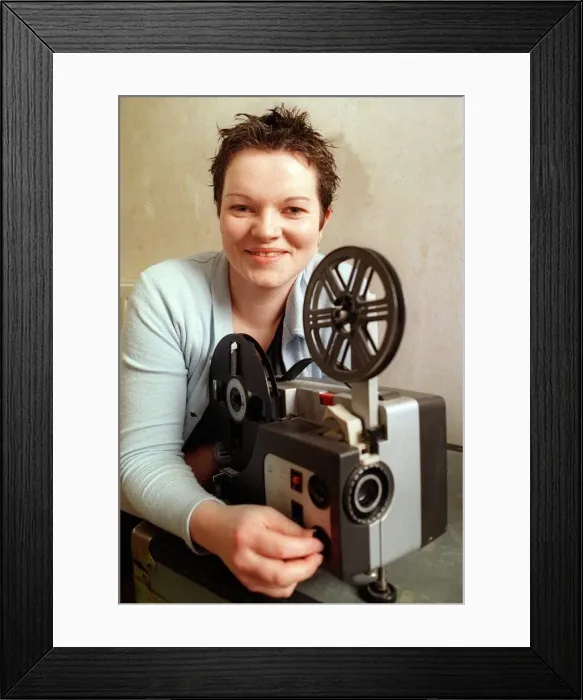 Framed Print : Karen David Belle and Sebastian February 1999 Member of group with cine projector Framed Print : Karen David Belle and Sebastian February 1999 Member of group with cine projector
