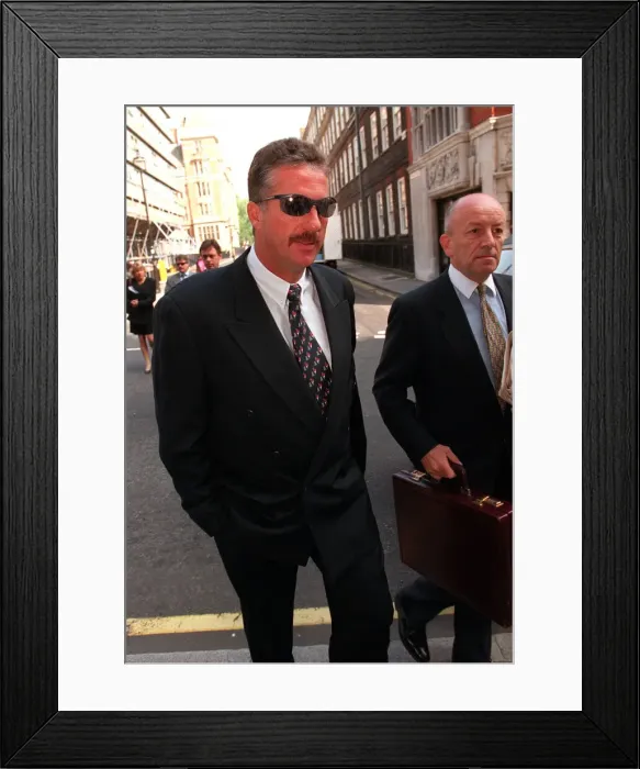 Framed Print : Ian Botham arrives with his lawer at the High Court for his libel case against Imran Khan