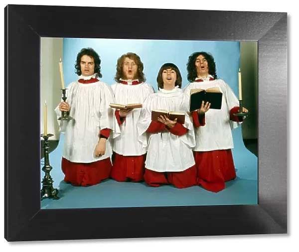 Slade dressed in choir boy outfits Christmas setting with candles
