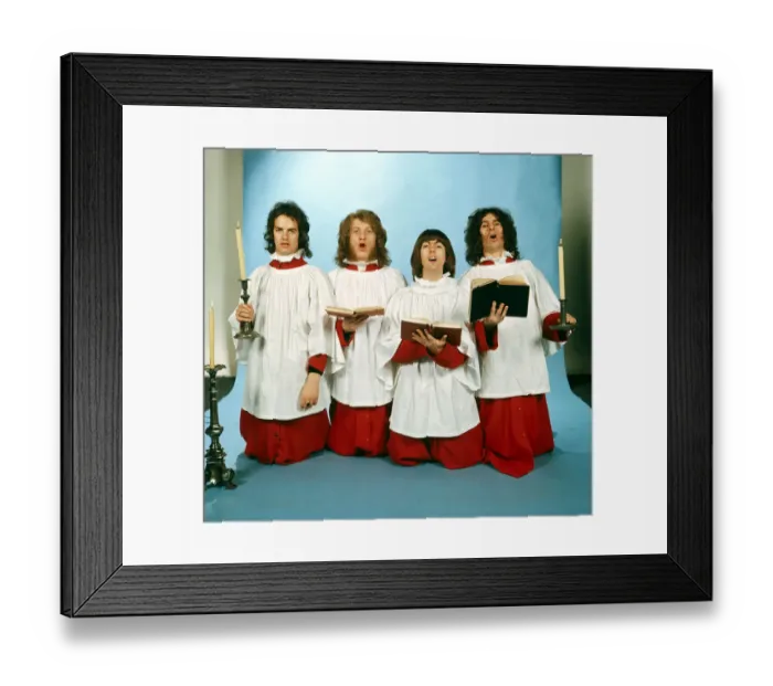 Framed Print : Slade dressed in choir boy outfits Christmas setting with candles