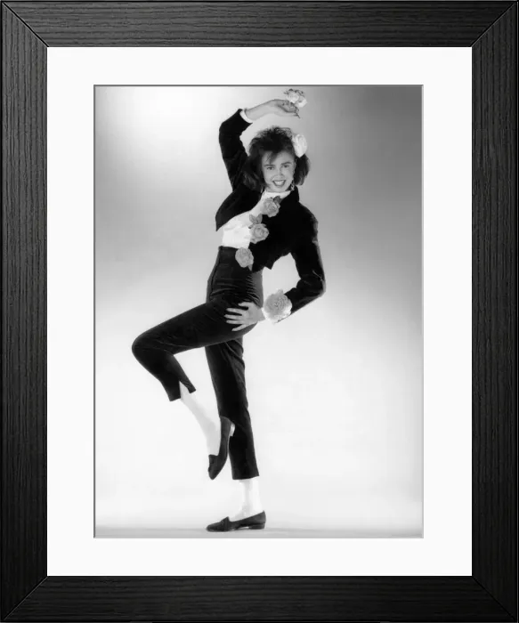Framed Print : Black velvet trousers, matching cropped jacket, suede flat shoes Framed Print : Black velvet trousers, matching cropped jacket, suede flat shoes