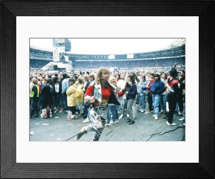 Framed Print : Audience gather outside the Wembley arena prior to the Michael Jackson concert Framed Print : Audience gather outside the Wembley arena prior to the Michael Jackson concert
