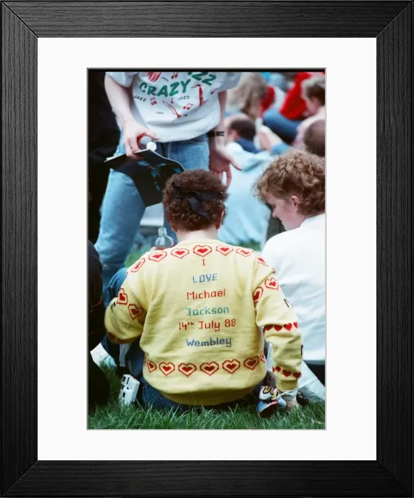 Framed Print : Audience gather outside the Wembley arena prior to the Michael Jackson concert Framed Print : Audience gather outside the Wembley arena prior to the Michael Jackson concert