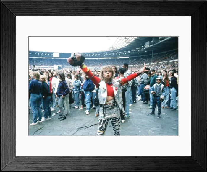 Framed Print : Audience gather outside the Wembley arena prior to the Michael Jackson concert Framed Print : Audience gather outside the Wembley arena prior to the Michael Jackson concert