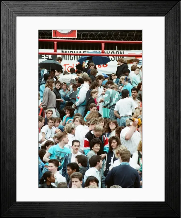 Framed Print : Audience gather outside the Wembley arena prior to the Michael Jackson concert