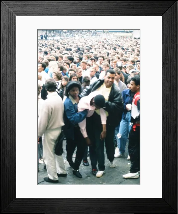 Framed Print : Audience gather outside the Wembley arena prior to the Michael Jackson concert