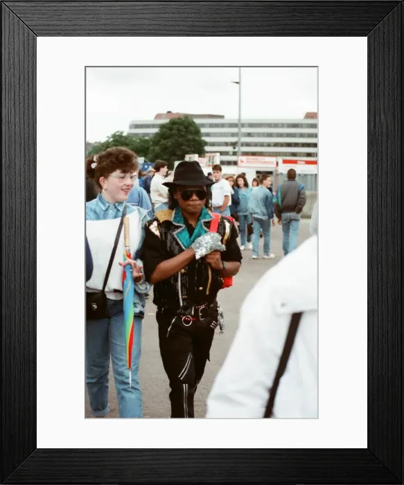 Framed Print : Audience gather outside the Wembley arena prior to the Michael Jackson concert
