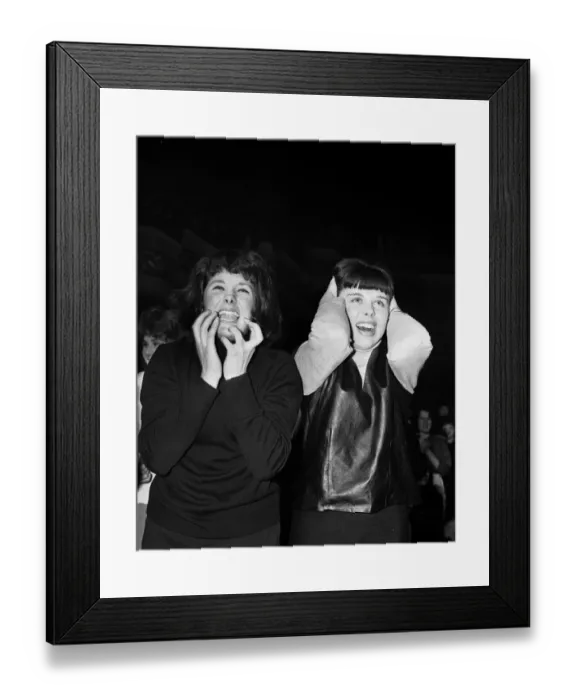 Framed Print : Two female fans watching The Beatles play at Manchester. 20th November 1963 Framed Print : Two female fans watching The Beatles play at Manchester. 20th November 1963