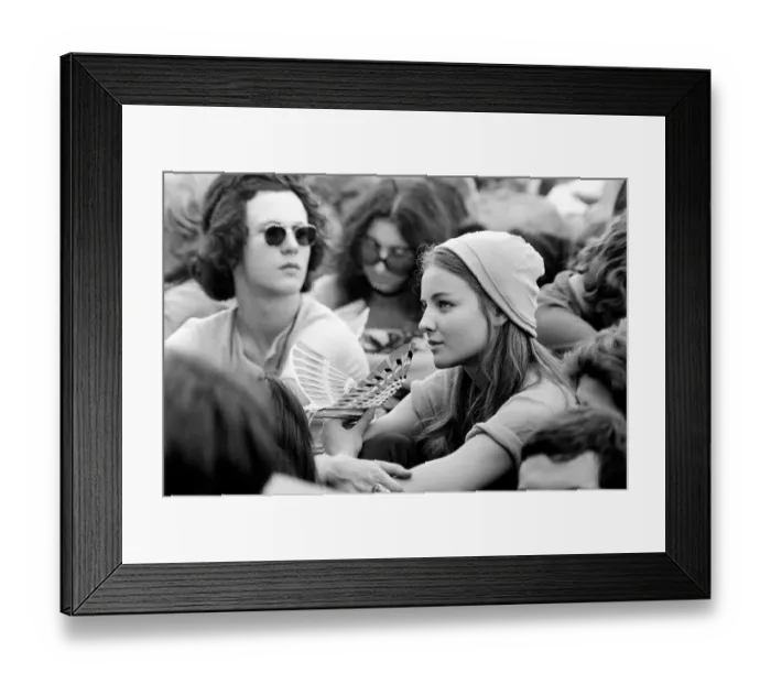 Framed Print : Hyde Park Pop Festival. A very pretty girl spotted in the crowd with a bird-like toy that