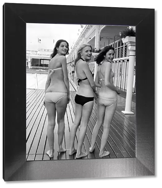 Three women modelling the latest in bikini fashions July 1970 70-6839-005