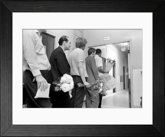 Framed Print : Queueing up outside ward 4 at the Mile End Hospital, London the men wait to visit their Framed Print : Queueing up outside ward 4 at the Mile End Hospital, London the men wait to visit their