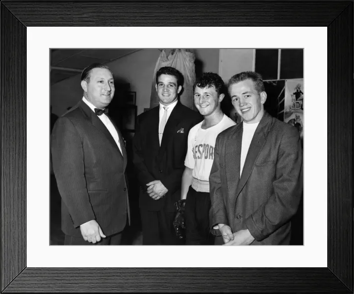 Framed Print : Benny Jacobs with some of his happy family'. Next to him is Phil Edwards then