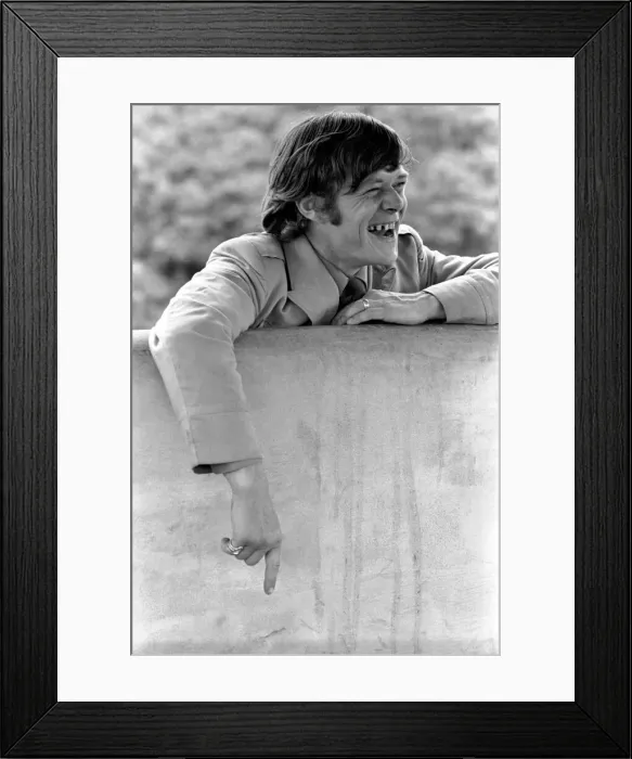 Framed Print : Snakes: Watched warily by his wife Patricia, snake handler Peter Waters goes back to work