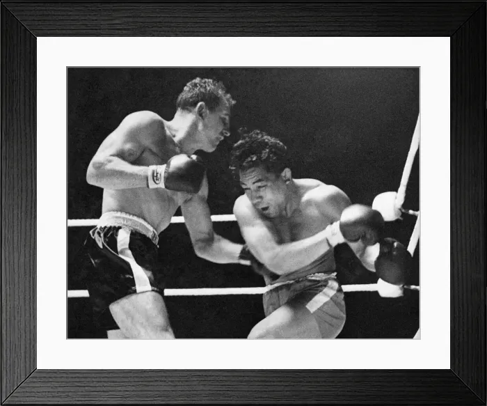 Framed Print : Johnny Halafihi (Tonga), doubles up as South African Mike Holt slams a left to the body Framed Print : Johnny Halafihi (Tonga), doubles up as South African Mike Holt slams a left to the body