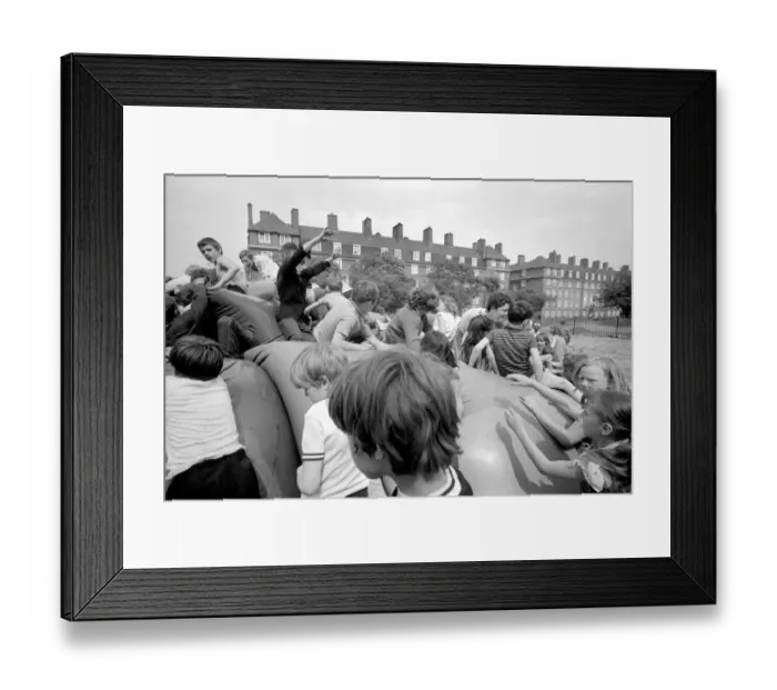 Framed Print : Kids in the Park: It was shoes off in Tabbard Gardens, Bermondsey, today (Saturday)