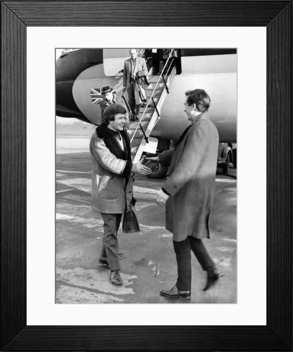 Framed Print : Albert Finney seen here being greeted on the apron of Manchester airport Framed Print : Albert Finney seen here being greeted on the apron of Manchester airport