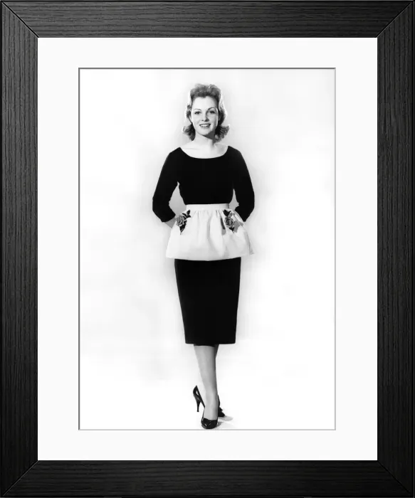Framed Print : Reveille Fashions. Mannequin modelling dress and apron. March 1960 P006992 Framed Print : Reveille Fashions. Mannequin modelling dress and apron. March 1960 P006992