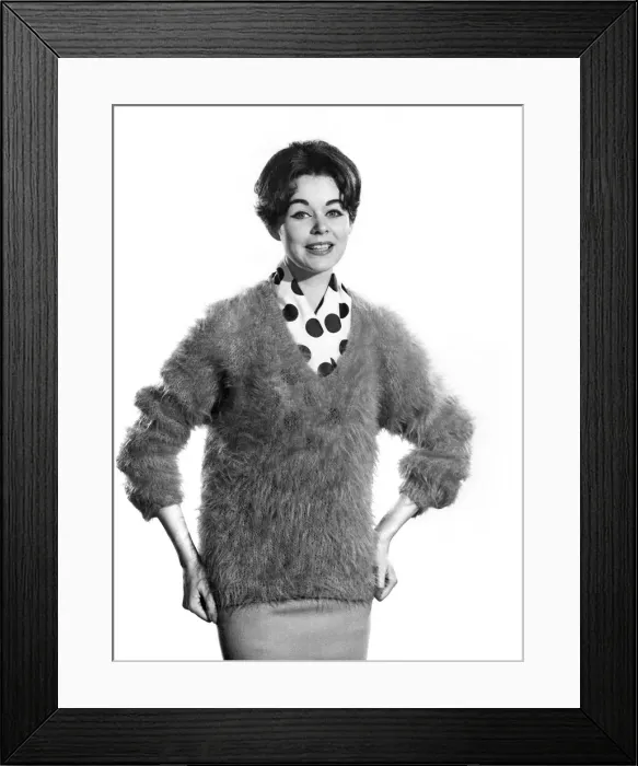Framed Print : Reveille Fashions: Jackie Jackson wearing a angora jumper with polka dot scarf Framed Print : Reveille Fashions: Jackie Jackson wearing a angora jumper with polka dot scarf