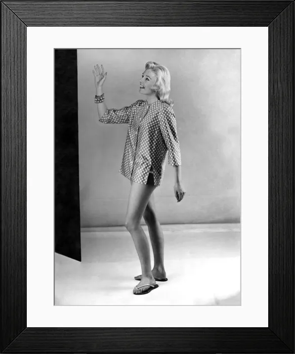 Framed Print : Reveille Fashions. Model wearing polka dot night shirt March 1959 P006938 Framed Print : Reveille Fashions. Model wearing polka dot night shirt March 1959 P006938