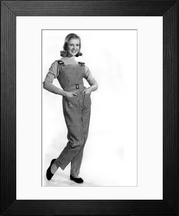Framed Print : Reveille Fashions: Mannequin Roma Reeves modelling a pair of Dungees. April 1959 P006909 Framed Print : Reveille Fashions: Mannequin Roma Reeves modelling a pair of Dungees. April 1959 P006909