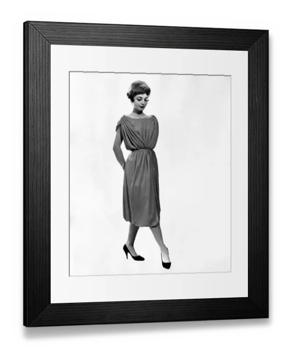 Framed Print : Clothing Fashion. Model wearing a belted evening dress. September 1958 P006905 Framed Print : Clothing Fashion. Model wearing a belted evening dress. September 1958 P006905