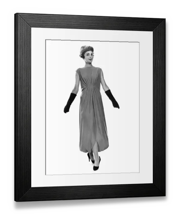 Framed Print : Reveille Fashions. Model wearing a evening dress and hair band by Best foot forward line