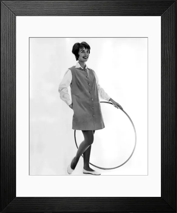 Framed Print : Clothing Fashion. Model wearing dress and holding a hula hoop. December 1958 P006893 Framed Print : Clothing Fashion. Model wearing dress and holding a hula hoop. December 1958 P006893