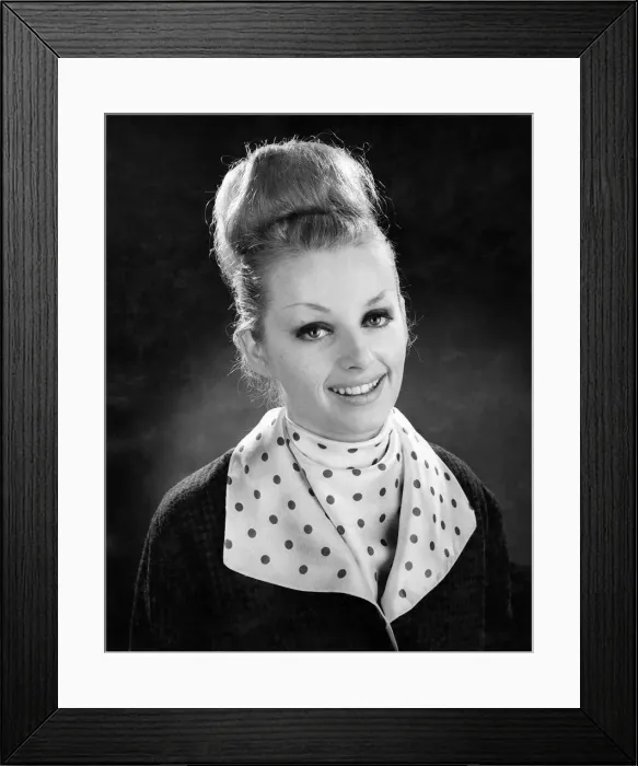 Framed Print : Reveille Fashions 1964. Model wearing coat with polka dot collar with matching top