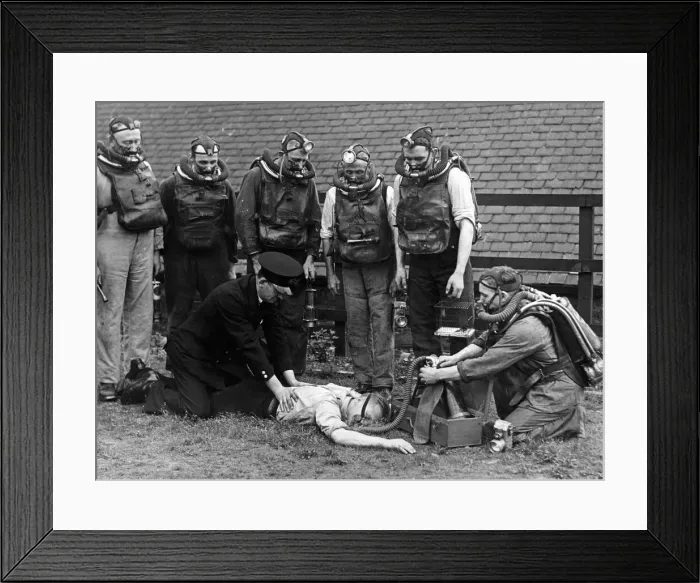 Framed Print : The fire and rescue team practicing to revive a miner overpowered at the coal face