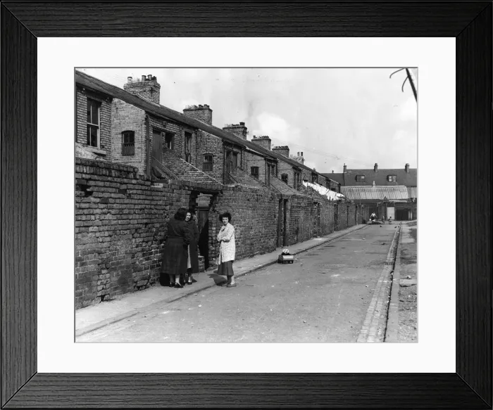 Framed Print : Derelict housing in an area of Newcastle - A group of women gossip in the back lane Framed Print : Derelict housing in an area of Newcastle - A group of women gossip in the back lane