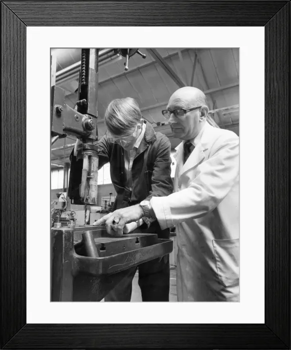 Framed Print : Ian Scarfe YTS trainee at NEI Reyrolles Hebburn receives tuition from instructor Ronald