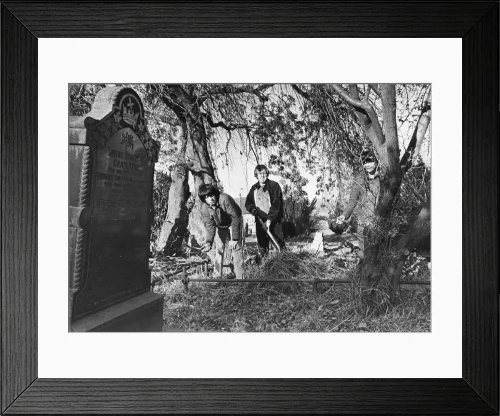 Framed Print : l to r, Malcolm Storey, George McCreedy and Ian Storey clean up the cemetery at Prudhoe