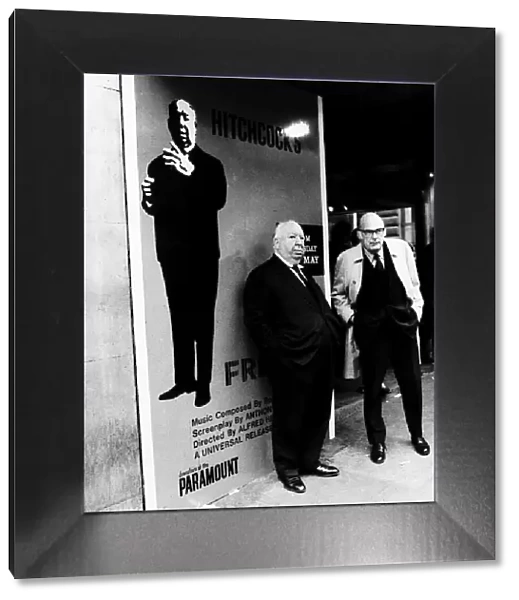 Alfred Hitchcock film director outside the Plaza Cinema in Londons Lower Regent Street