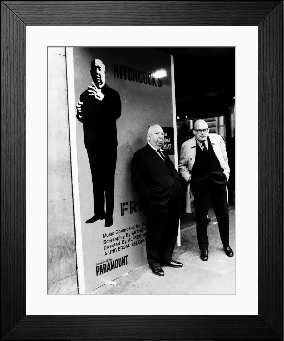 Framed Print : Alfred Hitchcock film director outside the Plaza Cinema in Londons Lower Regent Street