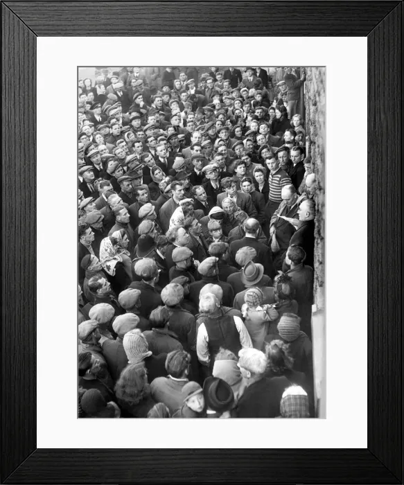 Framed Print : Relatives and friends wait anxiously for the latest news of the Easington Pit disaster