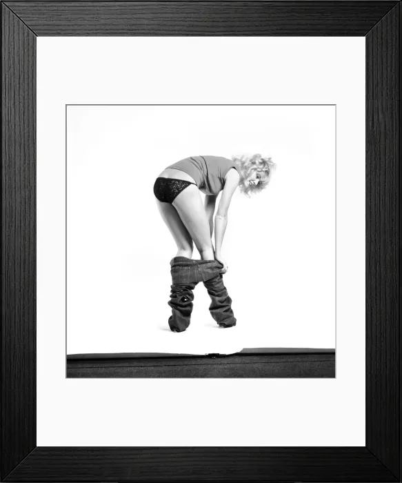 Framed Print : Fashion: Clothing: A woman pulling up a pair of denim jeans. January 1981 81-00051-004 Framed Print : Fashion: Clothing: A woman pulling up a pair of denim jeans. January 1981 81-00051-004