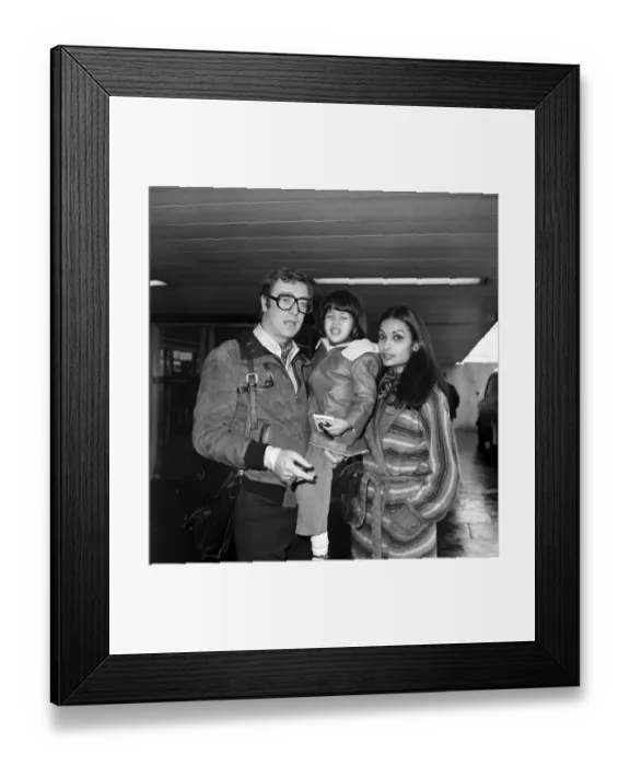 Framed Print : L. A. P. Michael Caine and Family. Actor Michael Caine and his wife Shakira leaving London Framed Print : L. A. P. Michael Caine and Family. Actor Michael Caine and his wife Shakira leaving London