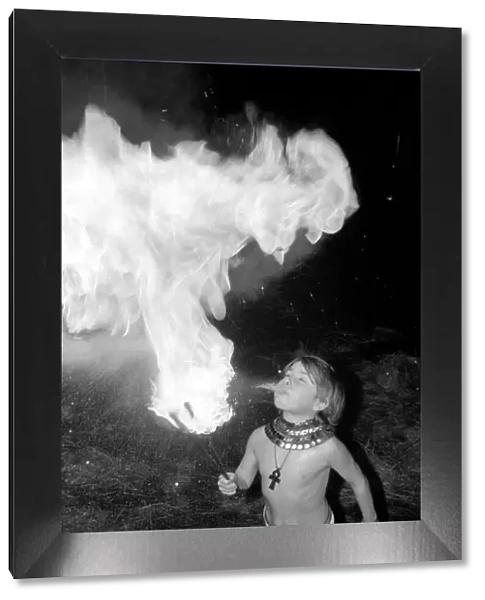 Unusual: Children. Fire Eater. 9 year old Tony Walls. Tony spitting a ball of flame