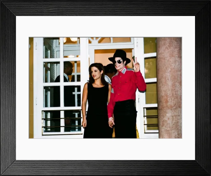 Framed Print : American pop singer Michael jackson with his new bride Lisa-Marie Presley during a visit
