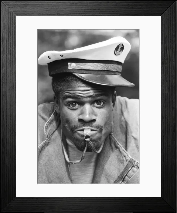 Framed Print : Boxer Errol Christie wearing a sailors hat. 28th August 1986