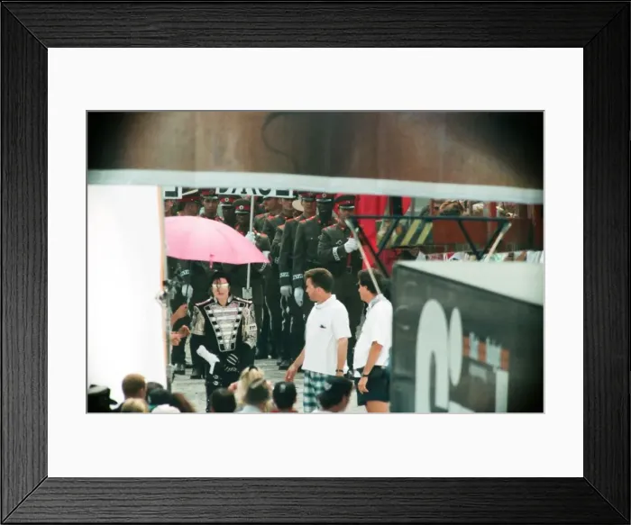 Framed Print : American pop singer Michael Jackson with his entourage on a walkabout in Budapest Framed Print : American pop singer Michael Jackson with his entourage on a walkabout in Budapest
