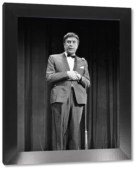 British comedian Frankie Howerd performs on stage during rehearsals for the Royal Variery