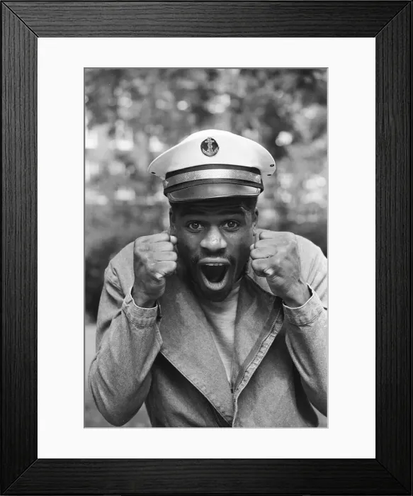 Framed Print : Boxer Errol Christie wearing a sailors hat. 28th August 1986 Framed Print : Boxer Errol Christie wearing a sailors hat. 28th August 1986