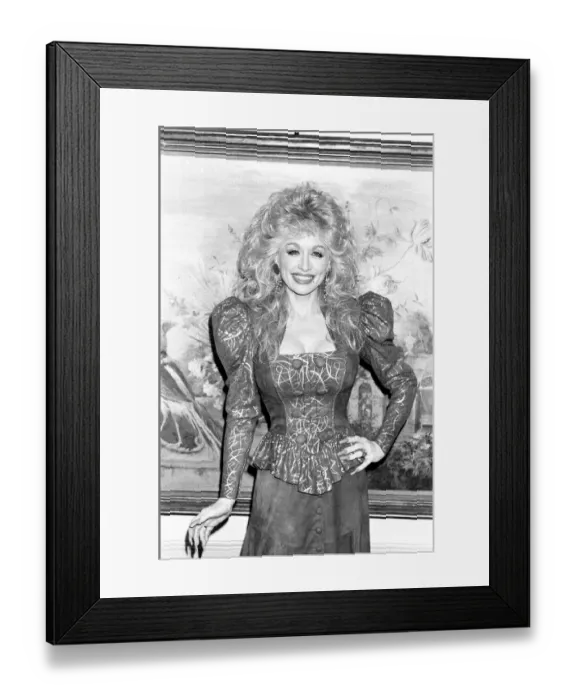 Framed Print : U. S. singer Dolly Parton seen here at the Dorchester Hotel, Central London